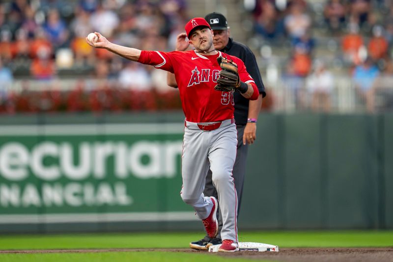 Sep 9, 2024; Minneapolis, Minnesota, USA; Los Angeles Angels second baseman Michael Stefanic (38) throws to first for an out against the Minnesota Twins in the second inning at Target Field. Mandatory Credit: Jesse Johnson-Imagn Images