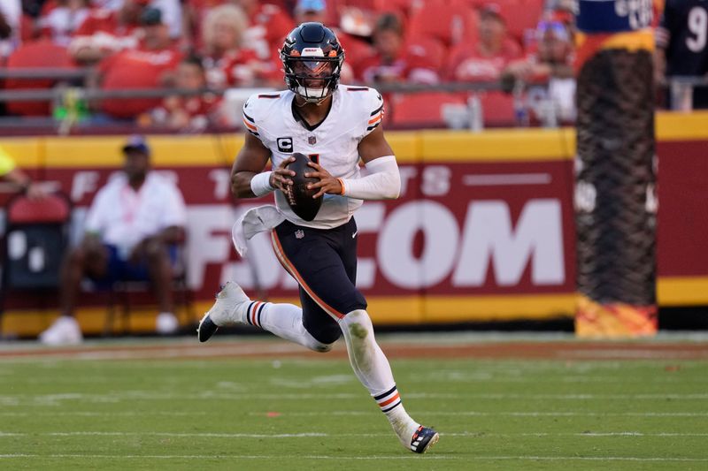 Chicago Bears quarterback Justin Fields runs the ball during the second half of an NFL football game against the Kansas City Chiefs Sunday, Sept. 24, 2023, in Kansas City, Mo. (AP Photo/Charlie Riedel)