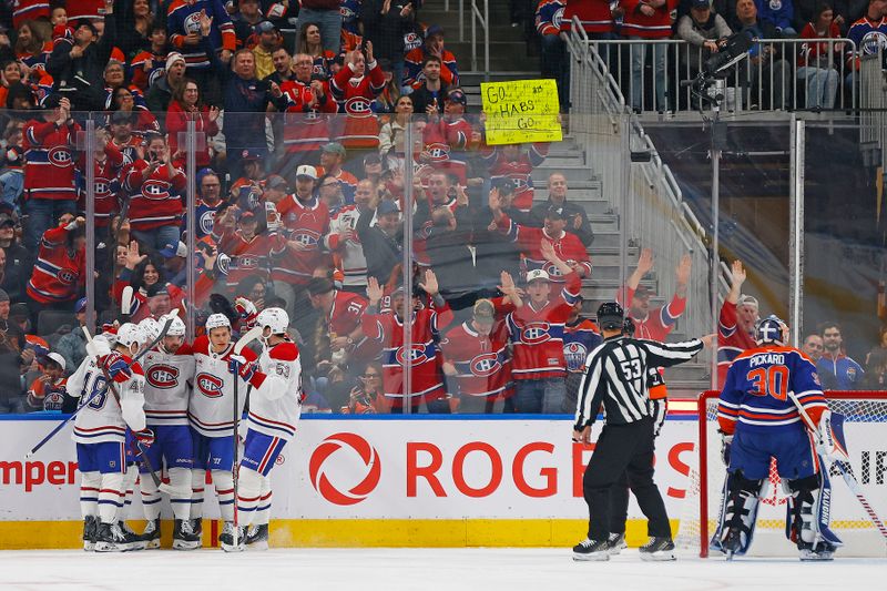 Oct 23, 2025; Edmonton, Alberta, CAN;  The Montreal Canadiens celebrate a goal scored by  forward Alex Newhook (15) during the first period against the Edmonton Oilers at Rogers Place. Mandatory Credit: Perry Nelson-Imagn Images