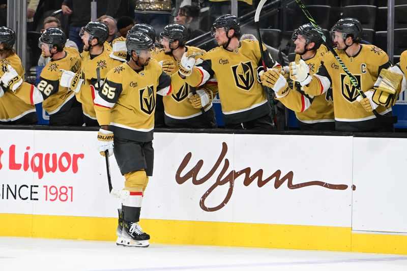 Oct 28, 2024; Las Vegas, Nevada, USA; Vegas Golden Knights right wing Keegan Kolesar (55) celebrates his third period goal with teammates against the Calgary Flames at T-Mobile Arena. Mandatory Credit: Candice Ward-Imagn Images