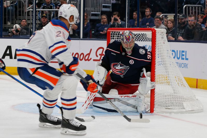 Oct 28, 2024; Columbus, Ohio, USA; Columbus Blue Jackets goalie Elvis Merzlikins (90) makes a save against the Edmonton Oilers during the third period at Nationwide Arena. Mandatory Credit: Russell LaBounty-Imagn Images