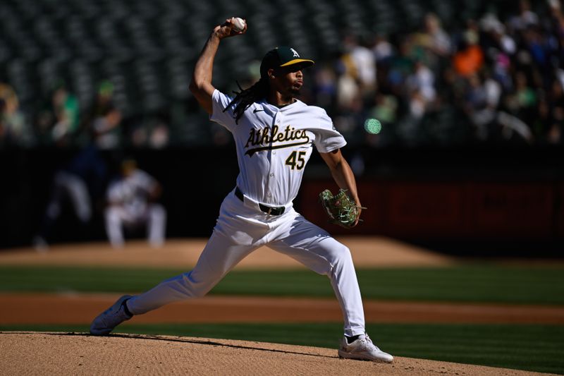 Sep 2, 2024; Oakland, California, USA; Oakland Athletics starting pitcher Osvaldo Bido (45) throws against the Seattle Mariners in the first inning at Oakland-Alameda County Coliseum. Mandatory Credit: Eakin Howard-USA TODAY Sports