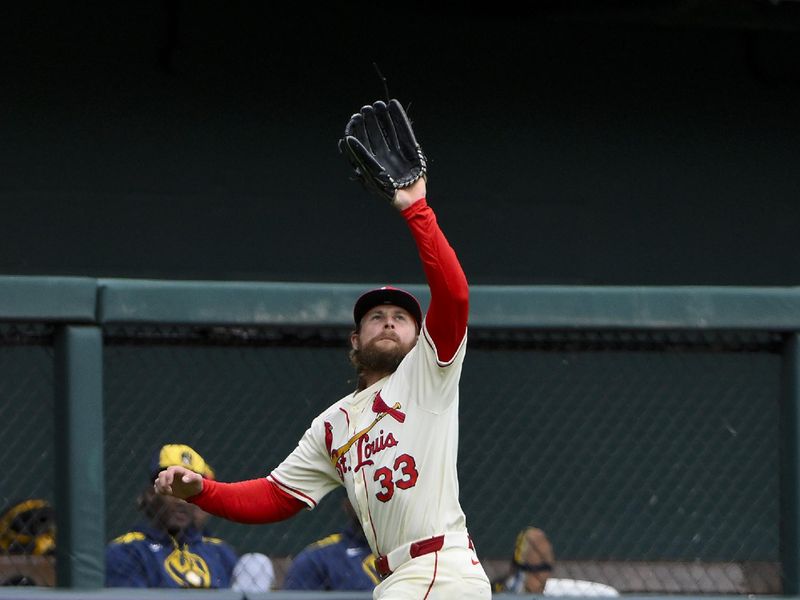Apr 26, 2025; St. Louis, Missouri, USA;  St. Louis Cardinals left fielder Brendan Donovan (33) catches a fly ball against the Milwaukee Brewers during the third inning at Busch Stadium. Mandatory Credit: Jeff Curry-Imagn Images
