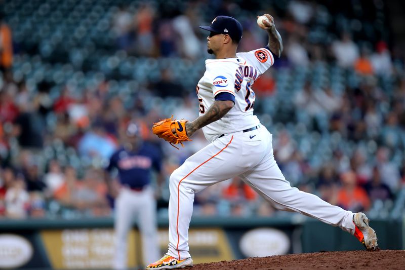 Aug 24, 2023; Houston, Texas, USA; Houston Astros catcher Martin Maldonado (15) delivers a pitch against the Boston Red Sox during the ninth inning at Minute Maid Park. Mandatory Credit: Erik Williams-USA TODAY Sports
