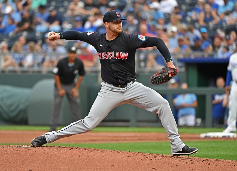 Jun 27, 2024; Kansas City, Missouri, USA; Cleveland Guardians starting pitcher Ben Lively (39) delivers a pitch in the first inning against the Kansas City Royals at Kauffman Stadium. Mandatory Credit: Peter Aiken-USA TODAY Sports