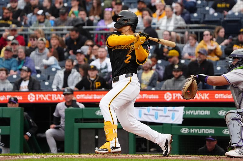 May 4, 2024; Pittsburgh, Pennsylvania, USA; Pittsburgh Pirates first baseman Connor Joe (2) hits a single against the Pittsburgh Pirates during the second inning at PNC Park. Mandatory Credit: Gregory Fisher-USA TODAY Sports