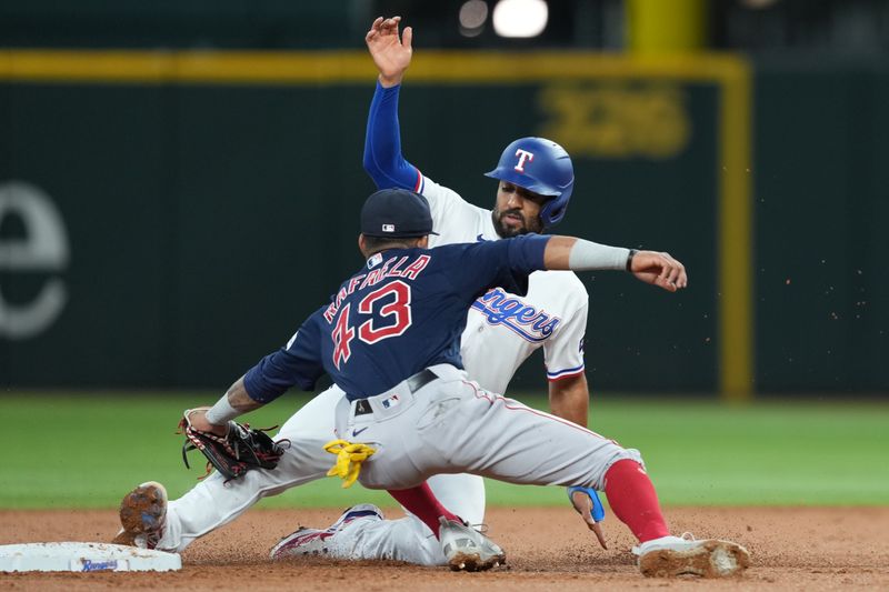 Sep 20, 2023; Arlington, Texas, USA; Texas Rangers second baseman Marcus Semien (2) is forced out at second by Boston Red Sox shortstop Ceddanne Rafaela (43) during the second inning at Globe Life Field. Mandatory Credit: Jim Cowsert-USA TODAY Sports