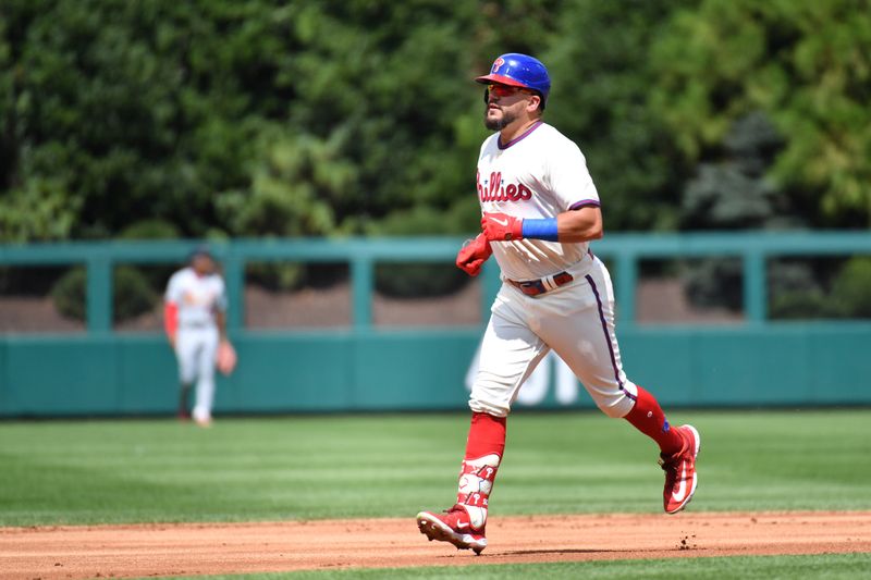 Aug 27, 2023; Philadelphia, Pennsylvania, USA; Philadelphia Phillies left fielder Kyle Schwarber (12) celebrates his home run against the St. Louis Cardinals during the first inning at Citizens Bank Park. Mandatory Credit: Eric Hartline-USA TODAY Sports