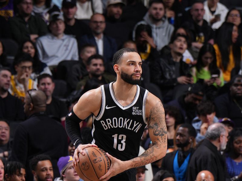 BROOKLYN, NY - MARCH 10: Tyrese Martin #13 of the Brooklyn Nets looks to pass the ball during the game against the Los Angeles Lakers on March 10, 2025 at Barclays Center in Brooklyn, New York. NOTE TO USER: User expressly acknowledges and agrees that, by downloading and or using this Photograph, user is consenting to the terms and conditions of the Getty Images License Agreement. Mandatory Copyright Notice: Copyright 2025 NBAE (Photo by Jesse D. Garrabrant/NBAE via Getty Images)