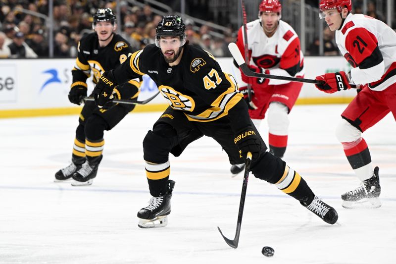 Nov 17, 2025; Boston, Massachusetts, USA; Boston Bruins center Mark Kastelic (47) skates against the Carolina Hurricanes during the first period at the TD Garden. Mandatory Credit: Brian Fluharty-Imagn Images