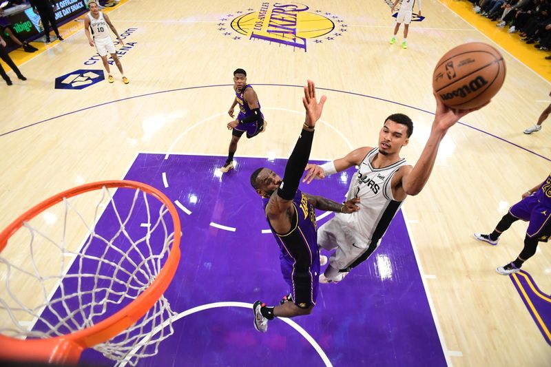 LOS ANGELES, CA - FEBRUARY 23:  Victor Wembanyama #1 of the San Antonio Spurs goes to the basket during the game on February 23, 2024 at Crypto.Com Arena in Los Angeles, California. NOTE TO USER: User expressly acknowledges and agrees that, by downloading and/or using this Photograph, user is consenting to the terms and conditions of the Getty Images License Agreement. Mandatory Copyright Notice: Copyright 2024 NBAE (Photo by Adam Pantozzi/NBAE via Getty Images)