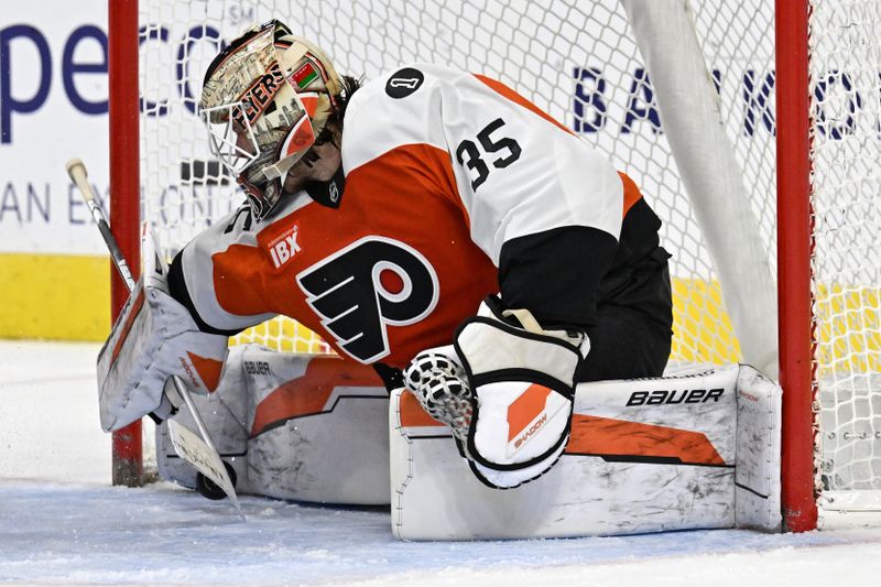 Nov 2, 2025; Philadelphia, Pennsylvania, USA; Philadelphia Flyers goaltender Aleksei Kolosov (35) makes a save against the Calgary Flames during the first period at Xfinity Mobile Arena. Mandatory Credit: Eric Hartline-Imagn Images