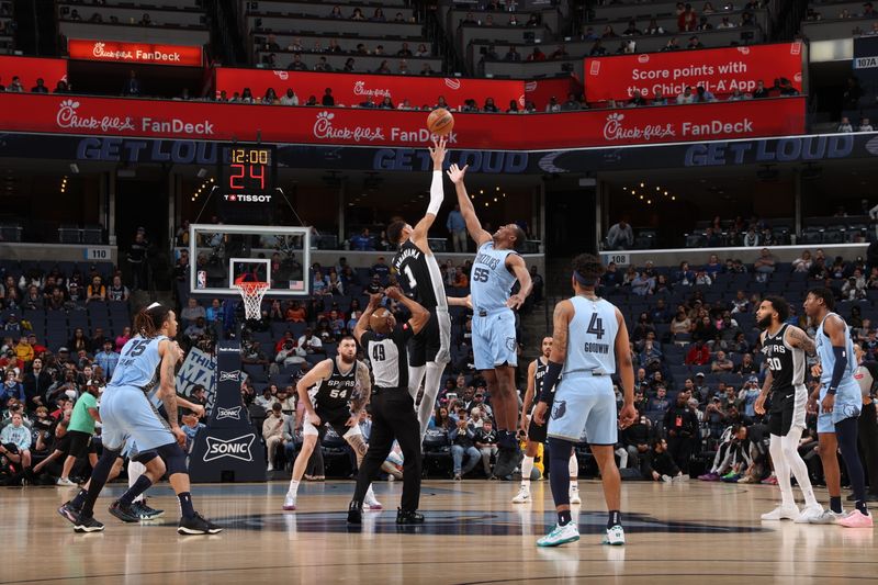 MEMPHIS, TN - APRIL 9: Victor Wembanyama #1 of the San Antonio Spurs goes up for the tipoff during the game against the Memphis Grizzlies on April 9, 2024 at FedExForum in Memphis, Tennessee. NOTE TO USER: User expressly acknowledges and agrees that, by downloading and or using this photograph, User is consenting to the terms and conditions of the Getty Images License Agreement. Mandatory Copyright Notice: Copyright 2024 NBAE (Photo by Joe Murphy/NBAE via Getty Images)