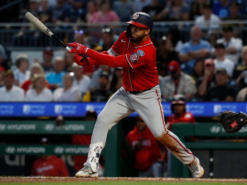 Sep 11, 2023; Pittsburgh, Pennsylvania, USA;  Washington Nationals second baseman Luis Garcia (2) hits in a run on a fielders choice infield hit against the Pittsburgh Pirates during the fourth inning at PNC Park. Mandatory Credit: Charles LeClaire-USA TODAY Sports