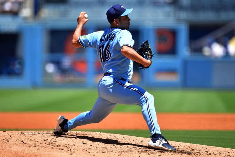 Jul 26, 2023; Los Angeles, California, USA; Toronto Blue Jays starting pitcher Yusei Kikuchi (16) throws against the Los Angeles Dodgers during the second inning at Dodger Stadium. Mandatory Credit: Gary A. Vasquez-USA TODAY Sports