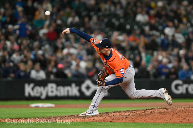 Sep 27, 2023; Seattle, Washington, USA; Houston Astros relief pitcher Ryan Pressly (55) pitches to the Seattle Mariners during the eighth inning at T-Mobile Park. Mandatory Credit: Steven Bisig-USA TODAY Sports