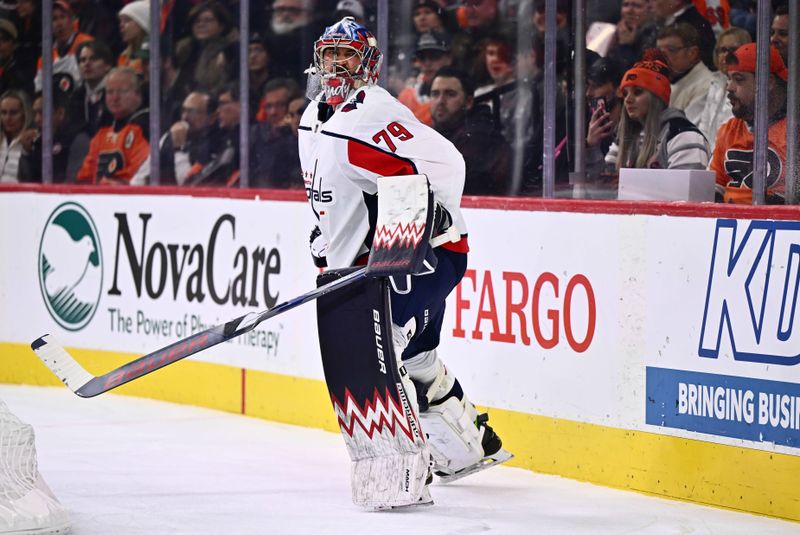 Dec 14, 2023; Philadelphia, Pennsylvania, USA; Washington Capitals goalie Charlie Lindgren (79) reacts after passing the puck against the Philadelphia Flyers in the first period at Wells Fargo Center. Mandatory Credit: Kyle Ross-USA TODAY Sports