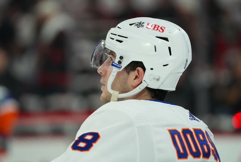 Apr 22, 2024; Raleigh, North Carolina, USA; New York Islanders defenseman Noah Dobson (8) looks on during the warmups before the game against the Carolina Hurricanes in game two of the first round of the 2024 Stanley Cup Playoffs at PNC Arena. Mandatory Credit: James Guillory-USA TODAY Sports