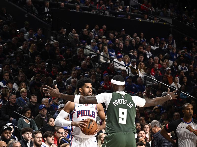 PHILADELPHIA, PA - FEBRUARY 25: Tobias Harris #12 of the Philadelphia 76ers looks to pass the ball during the game against the Milwaukee Bucks on February 25, 2024 at the Wells Fargo Center in Philadelphia, Pennsylvania NOTE TO USER: User expressly acknowledges and agrees that, by downloading and/or using this Photograph, user is consenting to the terms and conditions of the Getty Images License Agreement. Mandatory Copyright Notice: Copyright 2024 NBAE (Photo by David Dow/NBAE via Getty Images)