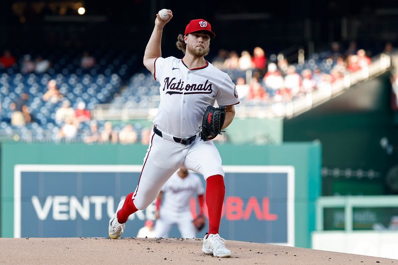 Jun 18, 2024; Washington, District of Columbia, USA; Washington Nationals starting pitcher Jake Irvin (27) pitches against the Arizona Diamondbacks during the first inning at Nationals Park. Mandatory Credit: Geoff Burke-USA TODAY Sports