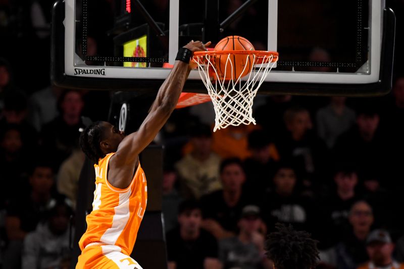 Jan 18, 2025; Nashville, Tennessee, USA;  Tennessee Volunteers forward Felix Okpara (34) dunks the ball against the Vanderbilt Commodores during the first half at Memorial Gymnasium. Mandatory Credit: Steve Roberts-Imagn Images