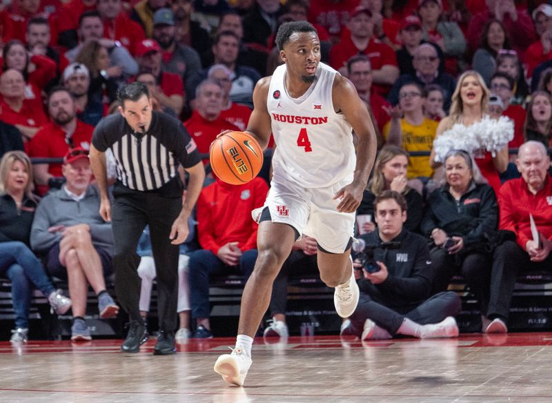 Jan 6, 2024; Houston, Texas, USA; Houston Cougars guard L.J. Cryer (4) dribbles against the West Virginia Mountaineers in the second half at Fertitta Center. Mandatory Credit: Thomas Shea-USA TODAY Sports