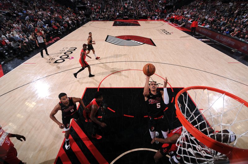 PORTLAND, OR - APRIL 12: Dalano Banton #5 of the Portland Trail Blazers shoots the ball during the game against the Houston Rockets on April 12, 2024 at the Moda Center Arena in Portland, Oregon. NOTE TO USER: User expressly acknowledges and agrees that, by downloading and or using this photograph, user is consenting to the terms and conditions of the Getty Images License Agreement. Mandatory Copyright Notice: Copyright 2024 NBAE (Photo by Cameron Browne/NBAE via Getty Images)