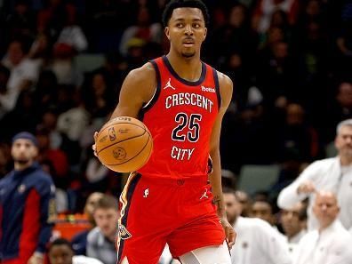 NEW ORLEANS, LOUISIANA - DECEMBER 23: Trey Murphy III #25 of the New Orleans Pelicans dribbles the ball down court during the second quarter of an NBA game against the Houston Rockets at Smoothie King Center on December 23, 2023 in New Orleans, Louisiana. NOTE TO USER: User expressly acknowledges and agrees that, by downloading and or using this photograph, User is consenting to the terms and conditions of the Getty Images License Agreement. (Photo by Sean Gardner/Getty Images)