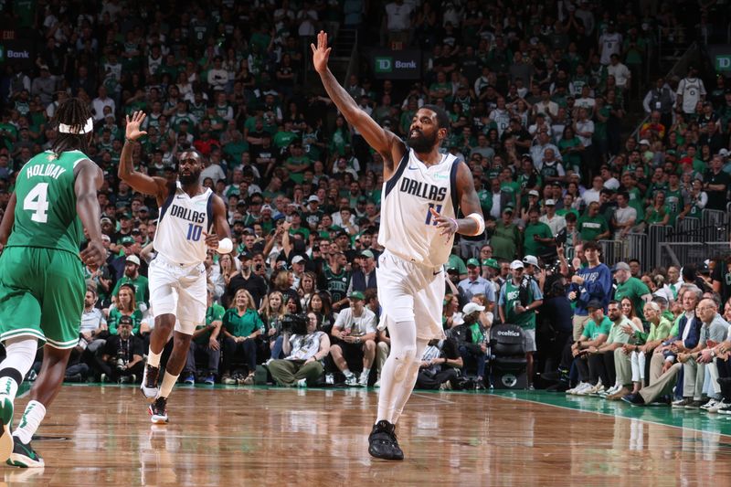 BOSTON, MA - JUNE 17: Kyrie Irving #11 of the Dallas Mavericks looks on during the game against the Boston Celtics during Game 5 of the 2024 NBA Finals on June 17, 2024 at the TD Garden in Boston, Massachusetts. NOTE TO USER: User expressly acknowledges and agrees that, by downloading and or using this photograph, User is consenting to the terms and conditions of the Getty Images License Agreement. Mandatory Copyright Notice: Copyright 2024 NBAE  (Photo by Nathaniel S. Butler/NBAE via Getty Images)