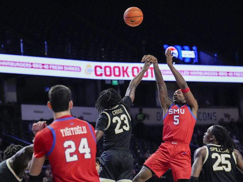Jan 20, 2026; Winston-Salem, North Carolina, USA; Southern Methodist University Mustangs guard Jaron Pierre Jr. (5) shoots a jump shot over Wake Forest Demon Deacons guard Jaylen Cross (23) during the second half at Lawrence Joel Veterans Memorial Coliseum. Mandatory Credit: Jim Dedmon-Imagn Images