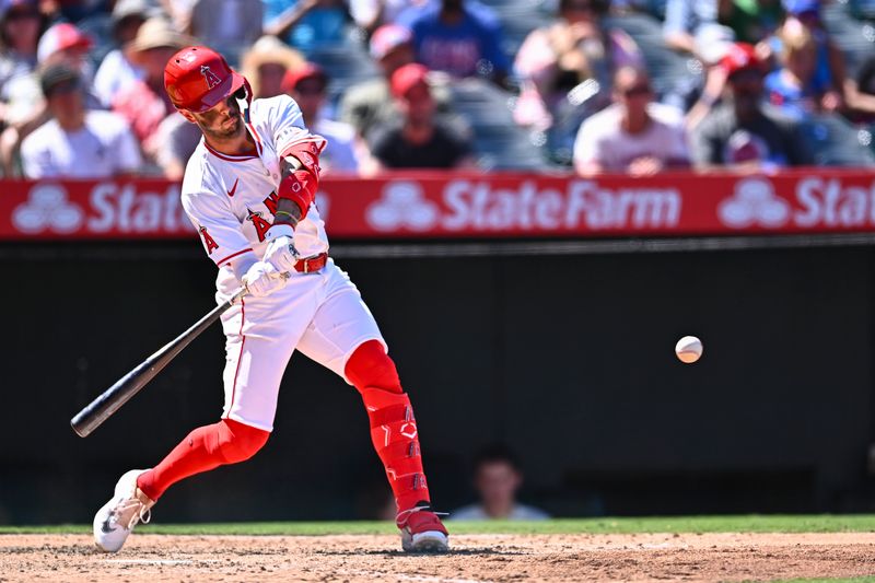 Aug 24, 2025; Anaheim, California, USA; Los Angeles Angels shortstop Zach Neto (9) singles against the Chicago Cubs during the sixth inning at Angel Stadium. Mandatory Credit: Jonathan Hui-Imagn Images