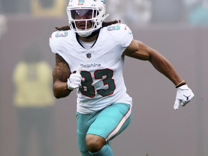 Miami Dolphins wide receiver Chase Claypool (83) runs during an NFL football game against the Washington Commanders, Sunday, December 03, 2023 in Landover, Md. (AP Photo/Daniel Kucin Jr.)