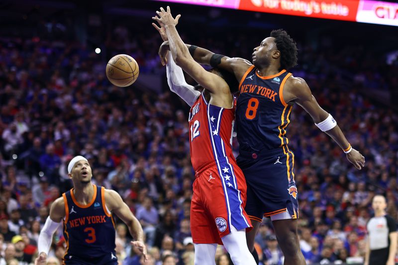 PHILADELPHIA, PENNSYLVANIA - APRIL 28: OG Anunoby #8 of the New York Knicks blocks Tobias Harris #12 of the Philadelphia 76ers during the second quarter of game four of the Eastern Conference First Round Playoffs at the Wells Fargo Center on April 28, 2024 in Philadelphia, Pennsylvania. NOTE TO USER: User expressly acknowledges and agrees that, by downloading and/or using this Photograph, user is consenting to the terms and conditions of the Getty Images License Agreement. (Photo by Tim Nwachukwu/Getty Images)