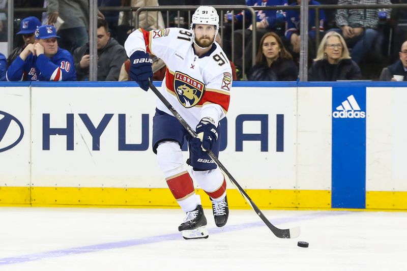 Mar 4, 2024; New York, New York, USA;  Florida Panthers defenseman Oliver Ekman-Larsson (91) makes a pass in the second period against the New York Rangers at Madison Square Garden. Mandatory Credit: Wendell Cruz-USA TODAY Sports