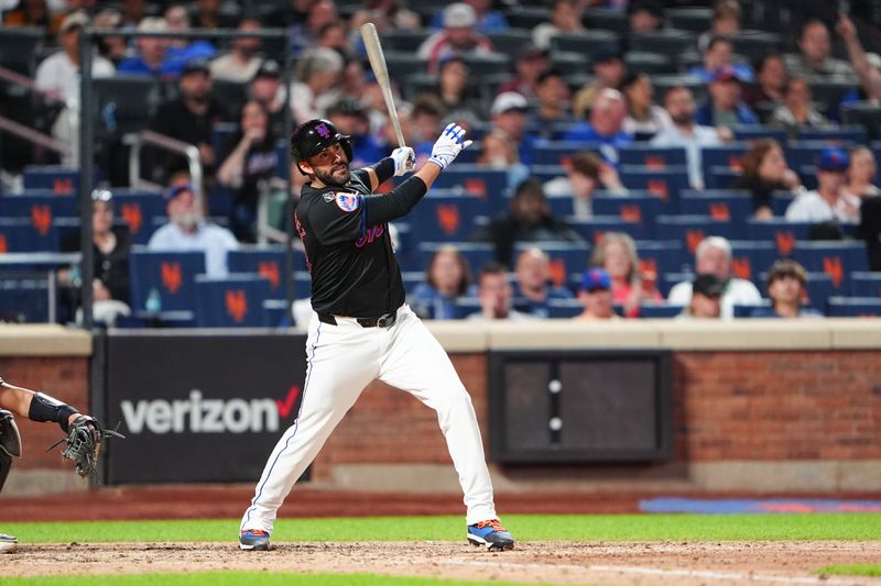 May 31, 2024; New York City, New York, USA; New York Mets designated hitter JD Martinez (28) watches his two-run home run against the Arizona Diamondbacks during the sixth inning at Citi Field. Mandatory Credit: Gregory Fisher-USA TODAY Sports