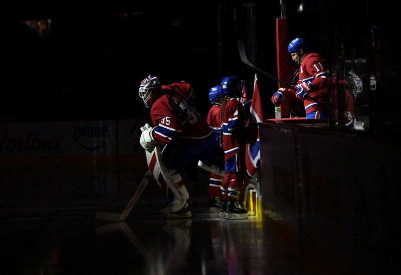 Jan 6, 2025; Montreal, Quebec, CAN; Montreal Canadiens goalie Sam Montembeault (35) and teammate forward Brendan Gallagher (11) step onto the ice before the game against the Vancouver Canucks at the Bell Centre. Mandatory Credit: Eric Bolte-Imagn Images