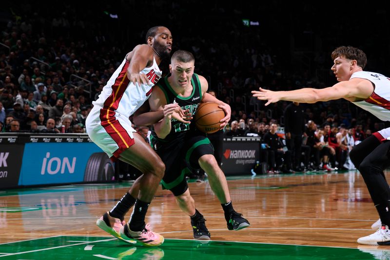 BOSTON, MA - DECEMBER 2: Payton Pritchard #11 of the Boston Celtics drives to the basket during the game against the Miami Heat on December 2, 2024 at TD Garden in Boston, Massachusetts. NOTE TO USER: User expressly acknowledges and agrees that, by downloading and/or using this Photograph, user is consenting to the terms and conditions of the Getty Images License Agreement. Mandatory Copyright Notice: Copyright 2024 NBAE (Photo by Brian Babineau/NBAE via Getty Images)