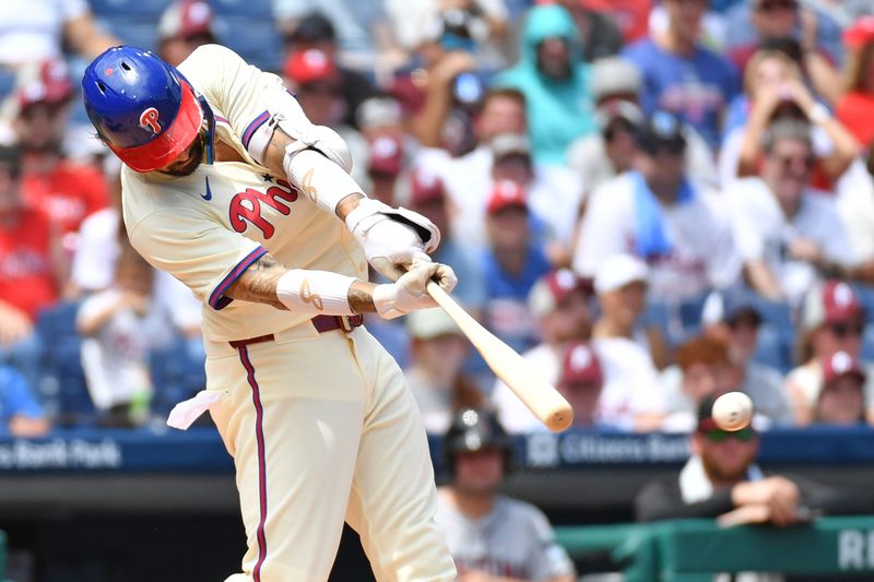 Jun 23, 2024; Philadelphia, Pennsylvania, USA; Philadelphia Phillies outfielder Nick Castellanos (8) hits an RBI single during the second inning against the Arizona Diamondbacks at Citizens Bank Park. Mandatory Credit: Eric Hartline-USA TODAY Sports