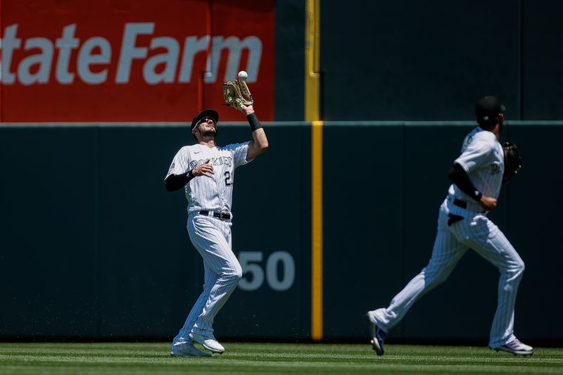 Jul 16, 2023; Denver, Colorado, USA; Colorado Rockies right fielder Kris Bryant (23) makes a catch in the second inning against the New York Yankees at Coors Field. Mandatory Credit: Isaiah J. Downing-USA TODAY Sports