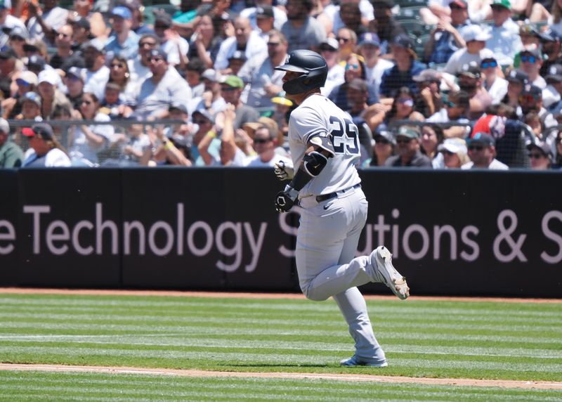 Jun 29, 2023; Oakland, California, USA; New York Yankees  designated hitter Gleyber Torres (25) runs to first base against the Oakland Athletics during the fifth inning at Oakland-Alameda County Coliseum. Mandatory Credit: Kelley L Cox-USA TODAY Sports