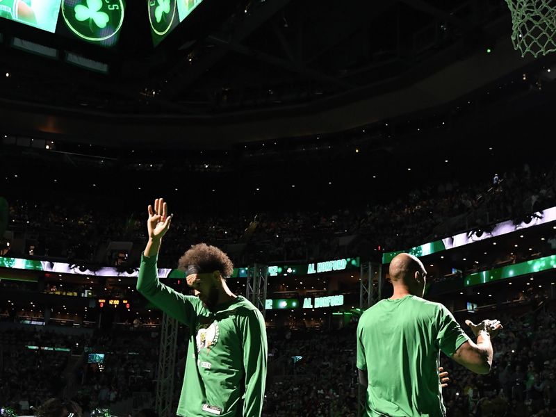 BOSTON, MA - DECEMBER 2: Derrick White #9 of the Boston Celtics is introduced before the game against the Miami Heat on December 2, 2022 at the TD Garden in Boston, Massachusetts.  NOTE TO USER: User expressly acknowledges and agrees that, by downloading and or using this photograph, User is consenting to the terms and conditions of the Getty Images License Agreement. Mandatory Copyright Notice: Copyright 2022 NBAE  (Photo by Brian Babineau/NBAE via Getty Images)