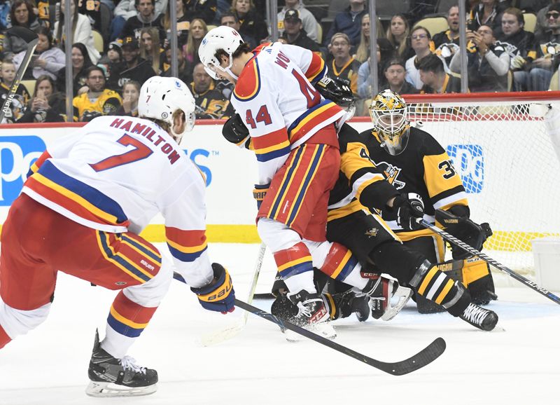 Dec 30, 2022; Pittsburgh, Pennsylvania, USA; New Jersey Devils defenseman Dougie Hamilton (7) shoots and scores on Pittsburgh Penguins goalie Tristan Jarry (35) as left wing Miles Wood (44) moves out of the way during the second period at PPG Paints Arena. Mandatory Credit: Philip G. Pavely-USA TODAY Sports