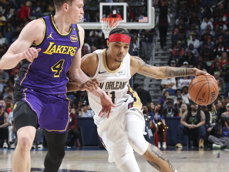 NEW ORLEANS, LA - NOVEMBER 16:  Brandon Boston Jr. #11 of the New Orleans Pelicans drives to the basket during the game against the Los Angeles Lakers on November 16, 2024 at the Smoothie King Center in New Orleans, Louisiana. NOTE TO USER: User expressly acknowledges and agrees that, by downloading and or using this Photograph, user is consenting to the terms and conditions of the Getty Images License Agreement. Mandatory Copyright Notice: Copyright 2024 NBAE (Photo by Layne Murdoch Jr./NBAE via Getty Images)