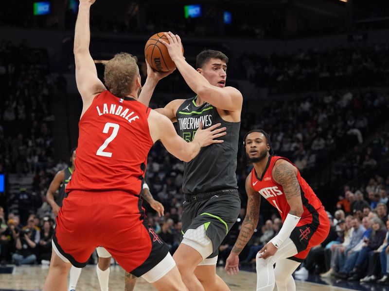 MINNEAPOLIS, MN -  FEBRUARY 6:  Luka Garza #55 of the Minnesota Timberwolves looks to pass the ball during the game against the Houston Rockets on February 6, 2025 at Target Center in Minneapolis, Minnesota. NOTE TO USER: User expressly acknowledges and agrees that, by downloading and or using this Photograph, user is consenting to the terms and conditions of the Getty Images License Agreement. Mandatory Copyright Notice: Copyright 2024 NBAE (Photo by Jordan Johnson/NBAE via Getty Images)