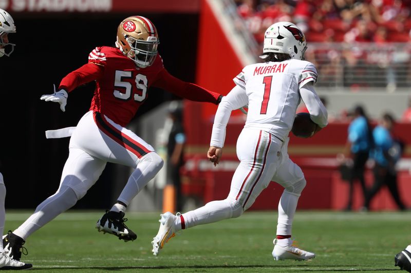 Arizona Cardinals quarterback Kyler Murray (1) runs against San Francisco 49ers linebacker De'Vondre Campbell Sr. (59) before scoring on the run during the first half of an NFL football game in Santa Clara, Calif., Sunday, Oct. 6, 2024. (AP Photo/Jed Jacobsohn)