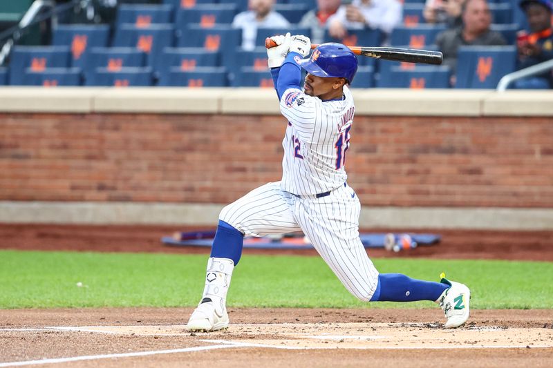 May 30, 2024; New York City, New York, USA; New York Mets shortstop Francisco Lindor (12) hits a single in the first inning against the Arizona Diamondbacks at Citi Field. Mandatory Credit: Wendell Cruz-USA TODAY Sports