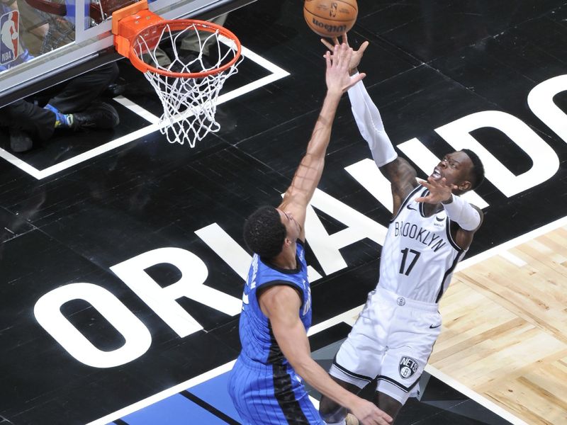 ORLANDO, FL - FEBRUARY 27: Dennis Schroder #17 of the Brooklyn Nets drives to the basket during the game against the Orlando Magic on February 27, 2024 at the Kia Center in Orlando, Florida. NOTE TO USER: User expressly acknowledges and agrees that, by downloading and or using this photograph, User is consenting to the terms and conditions of the Getty Images License Agreement. Mandatory Copyright Notice: Copyright 2024 NBAE (Photo by Fernando Medina/NBAE via Getty Images)