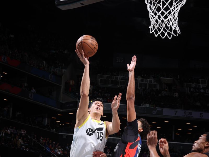 BROOKLYN, NY - JANUARY 29: Simone Fontecchio #16 of the Utah Jazz drives to the basket during the game against the Brooklyn Nets on January 29, 2024 at Barclays Center in Brooklyn, New York. NOTE TO USER: User expressly acknowledges and agrees that, by downloading and or using this Photograph, user is consenting to the terms and conditions of the Getty Images License Agreement. Mandatory Copyright Notice: Copyright 2024 NBAE (Photo by Nathaniel S. Butler/NBAE via Getty Images)