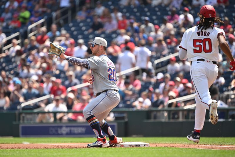 Jul 4, 2024; Washington, District of Columbia, USA; New York Mets first baseman Pete Alonso (20) catches the ball at first base for n out in front of fWashington Nationals center fielder James Wood (50) at Nationals Park. Mandatory Credit: Rafael Suanes-USA TODAY Sports