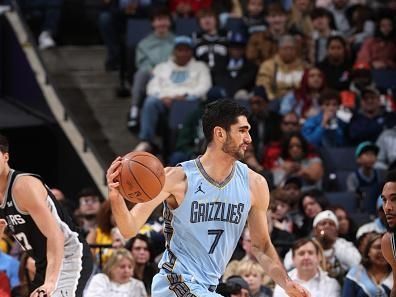 MEMPHIS, TN - JANUARY 2:  Santi Aldama #7 of the Memphis Grizzlies passes the ball during the game  on January 2, 2024 at FedExForum in Memphis, Tennessee. NOTE TO USER: User expressly acknowledges and agrees that, by downloading and or using this photograph, User is consenting to the terms and conditions of the Getty Images License Agreement. Mandatory Copyright Notice: Copyright 2024 NBAE (Photo by Joe Murphy/NBAE via Getty Images)